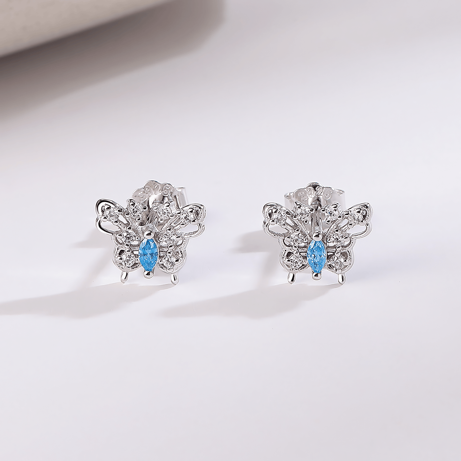 Blue Butterfly Stud Earrings – 925 Sterling Silver with Sparkling CZ Wing - NAFALUXE