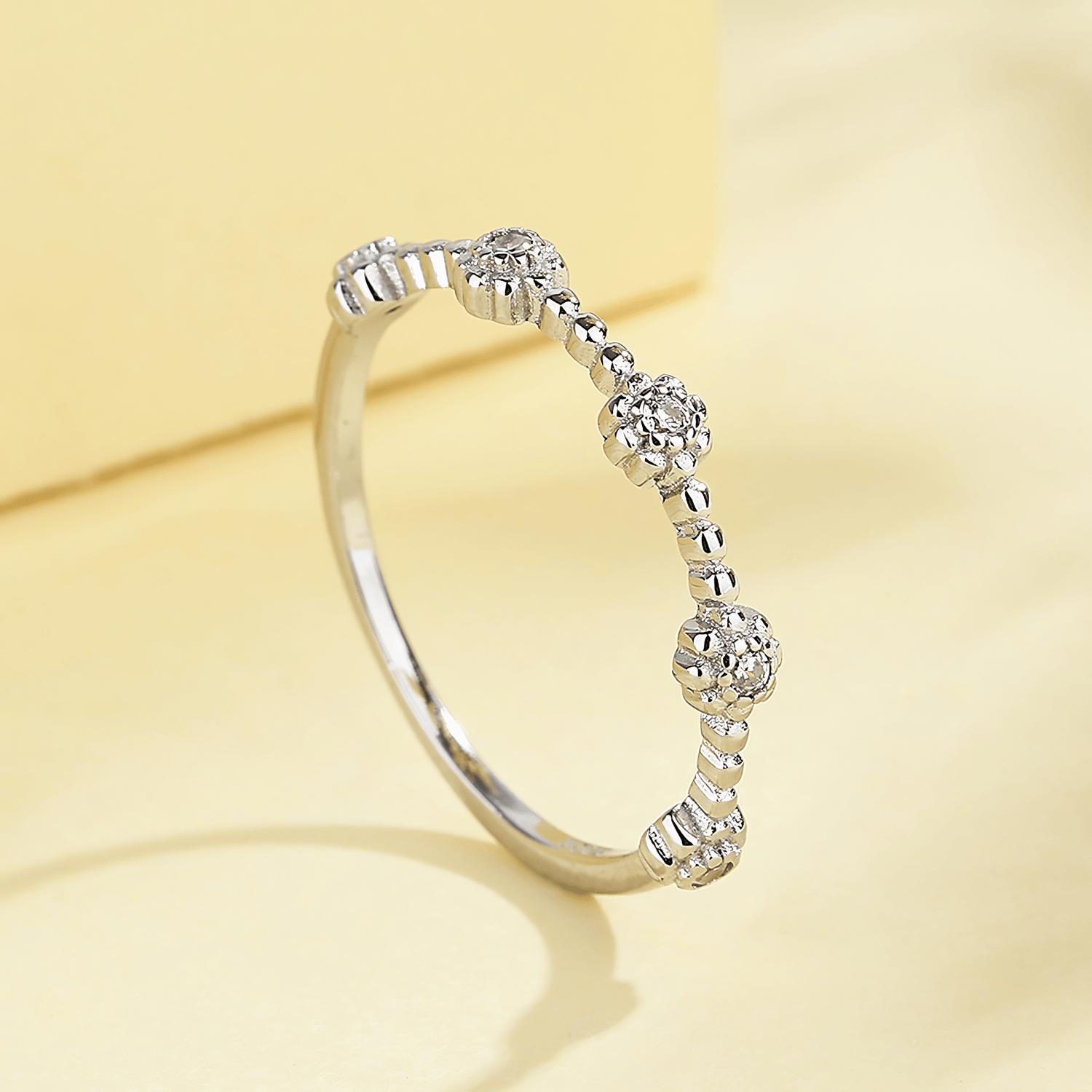 Petite Blossom – Sterling Silver Beaded Ring with Floral CZ Accents - NAFALUXE