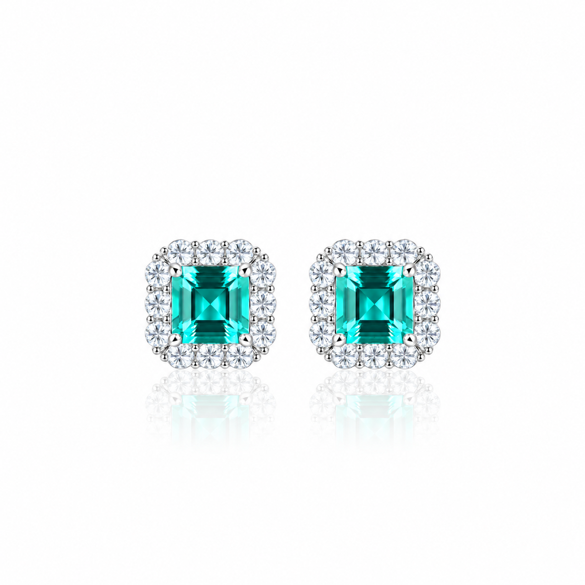 Elegant Emerald-Cut Aqua Blue CZ Halo Stud Earrings in Sterling Silver