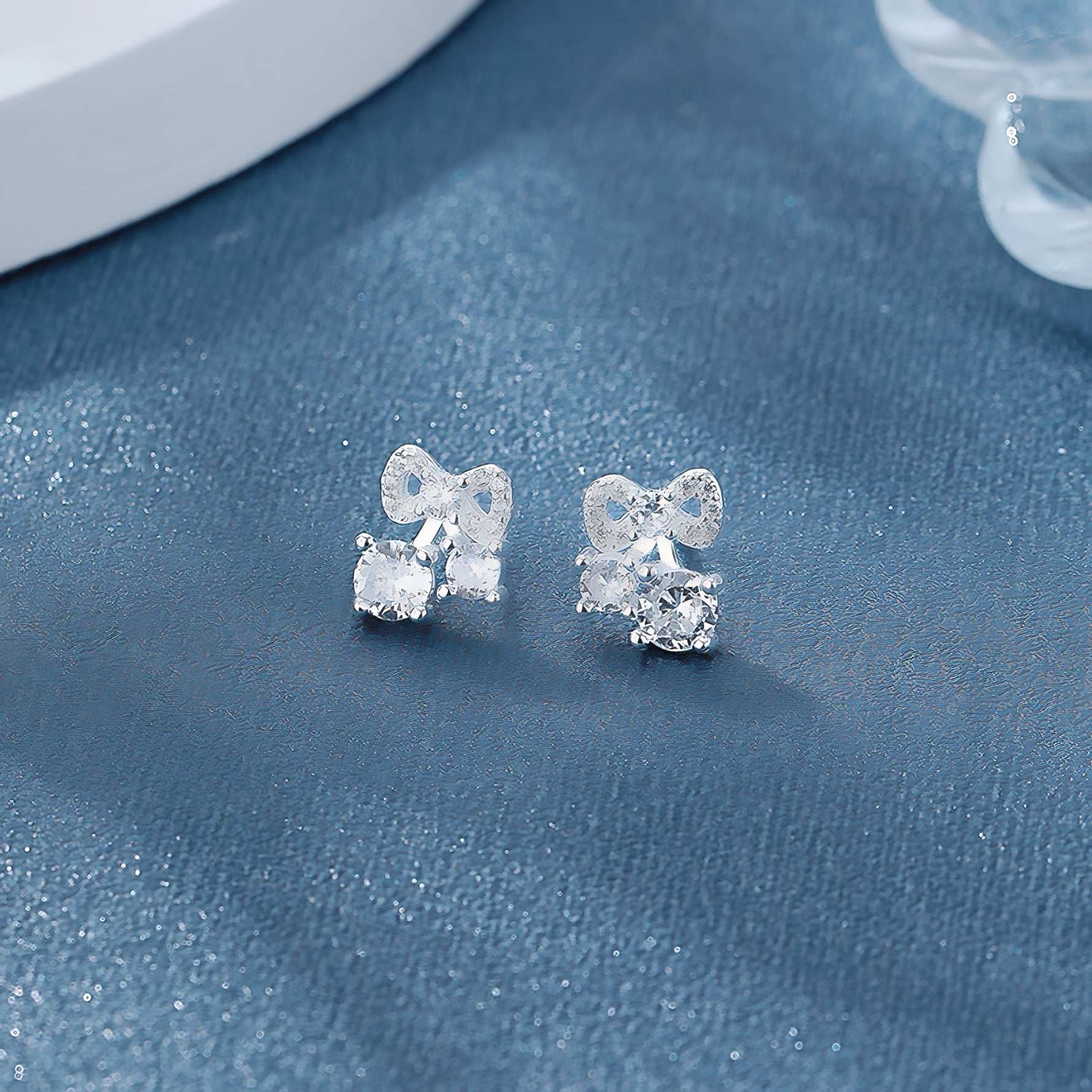 925 Sterling Silver Bow Stud Earrings with AAA Cubic Zirconia Trio - NAFALUXE