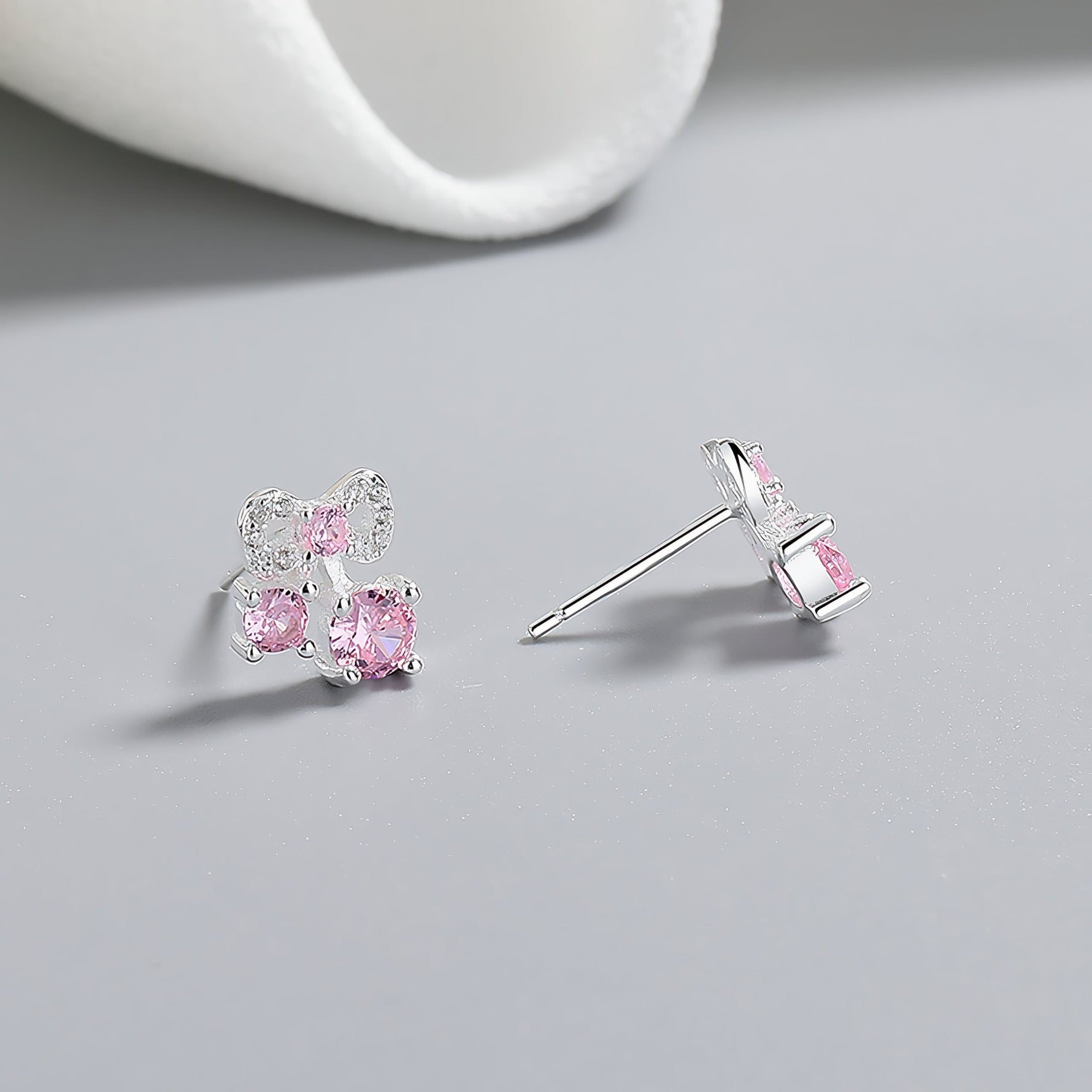925 Sterling Silver Bow Stud Earrings with Pink AAA Cubic Zirconia Trio - NAFALUXE