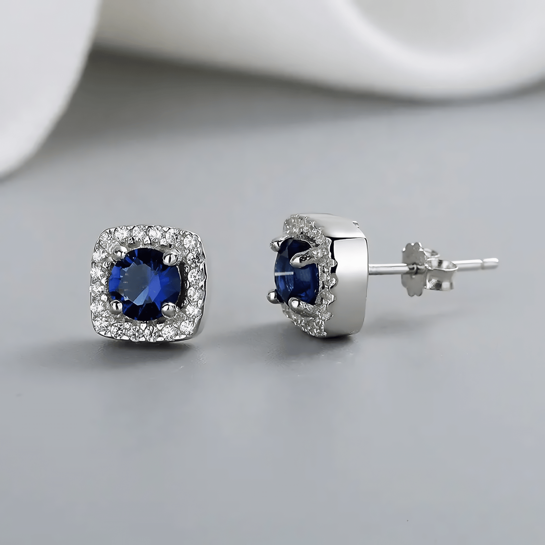 925 Sterling Silver Cushion Stud Earrings with Blue Center and Halo AAA Cubic Zirconia - NAFALUXE