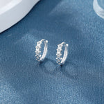 925 Sterling Silver Star Huggie Hoop Earrings with AAA Cubic Zirconia - NAFALUXE