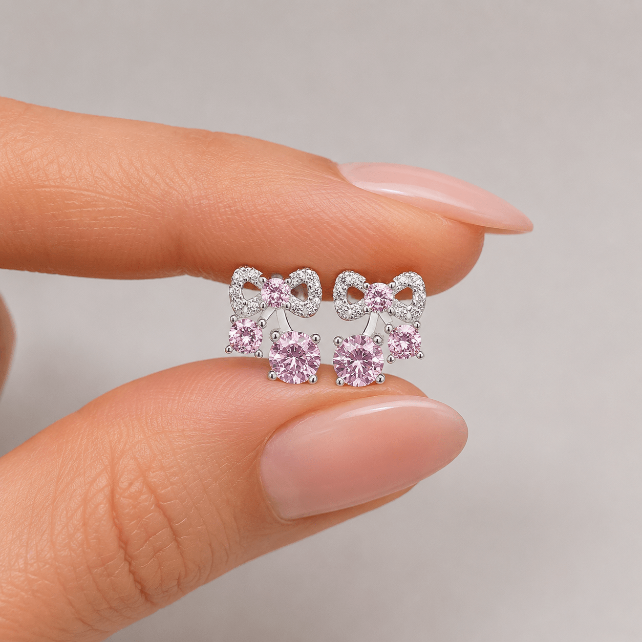 Bow Stud Earrings with Pink AAA Cubic Zirconia Trio - NAFALUXE