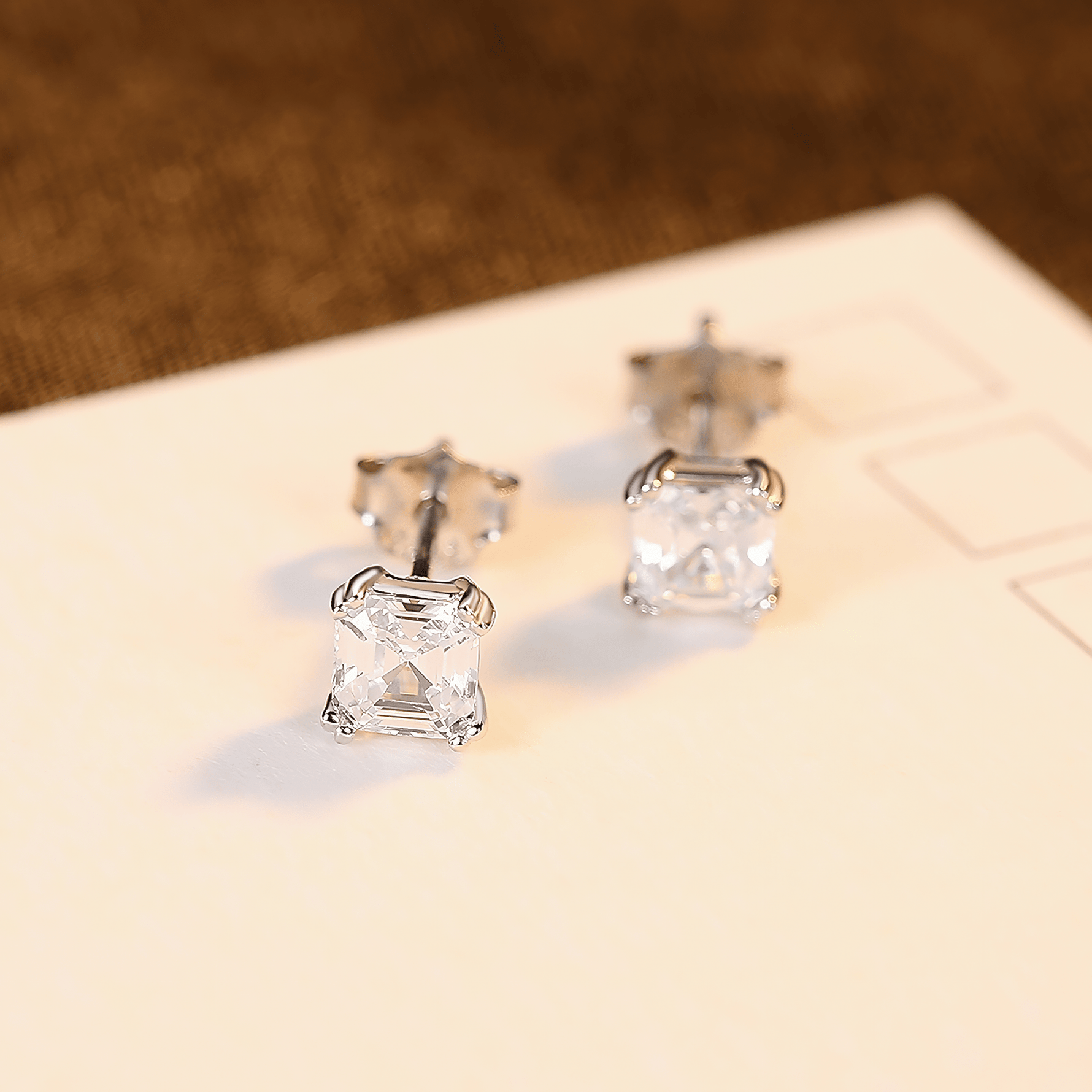 Classic Emerald - Cut CZ Sterling Silver Stud Earrings - NAFALUXE