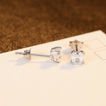 Classic Emerald - Cut CZ Sterling Silver Stud Earrings - NAFALUXE