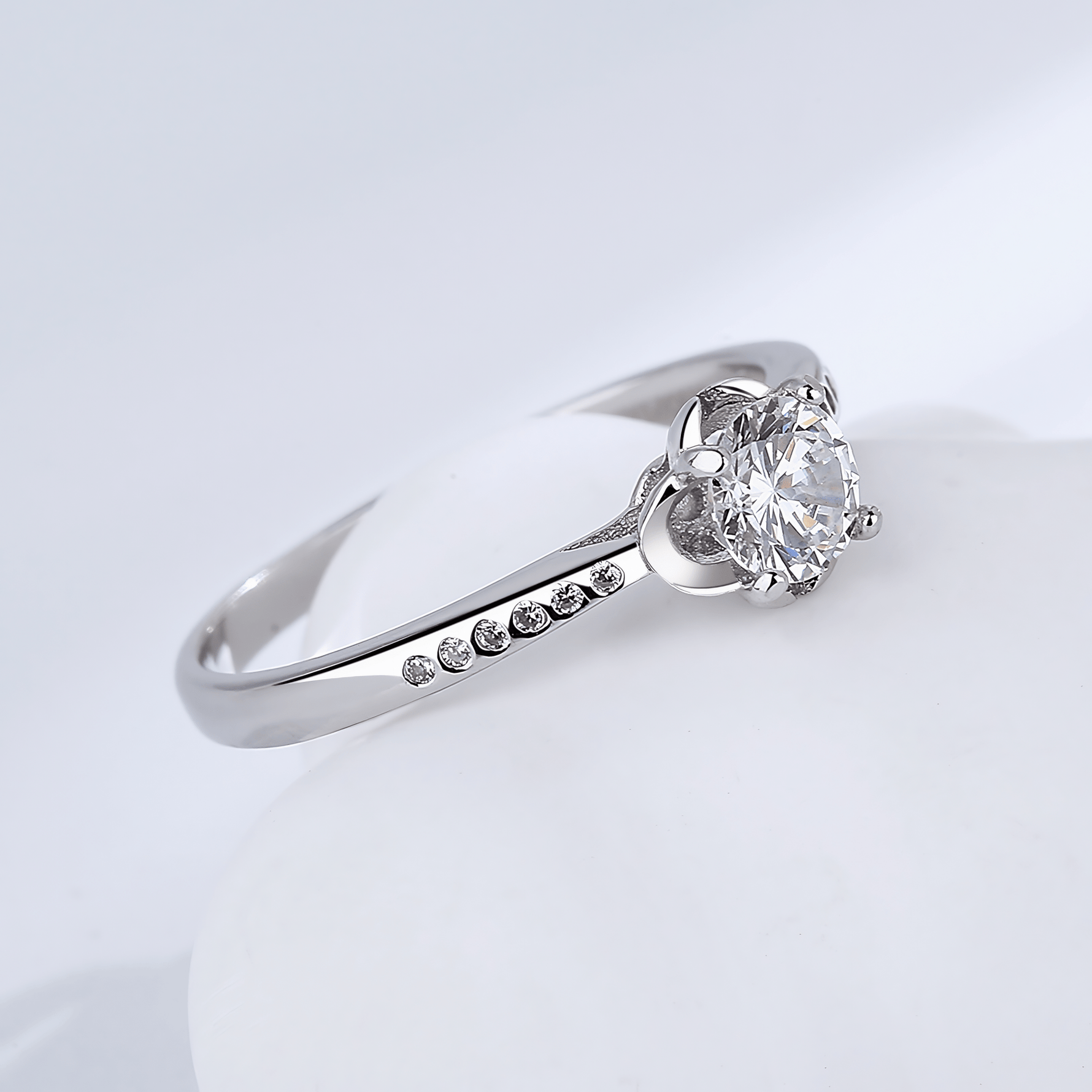 Classic Solitaire Elegance Ring in Sterling Silver with Side Accents - NAFALUXE