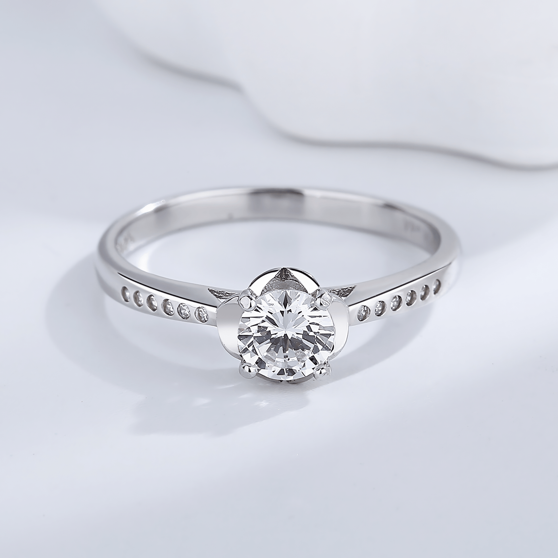 Classic Solitaire Elegance Ring in Sterling Silver with Side Accents - NAFALUXE