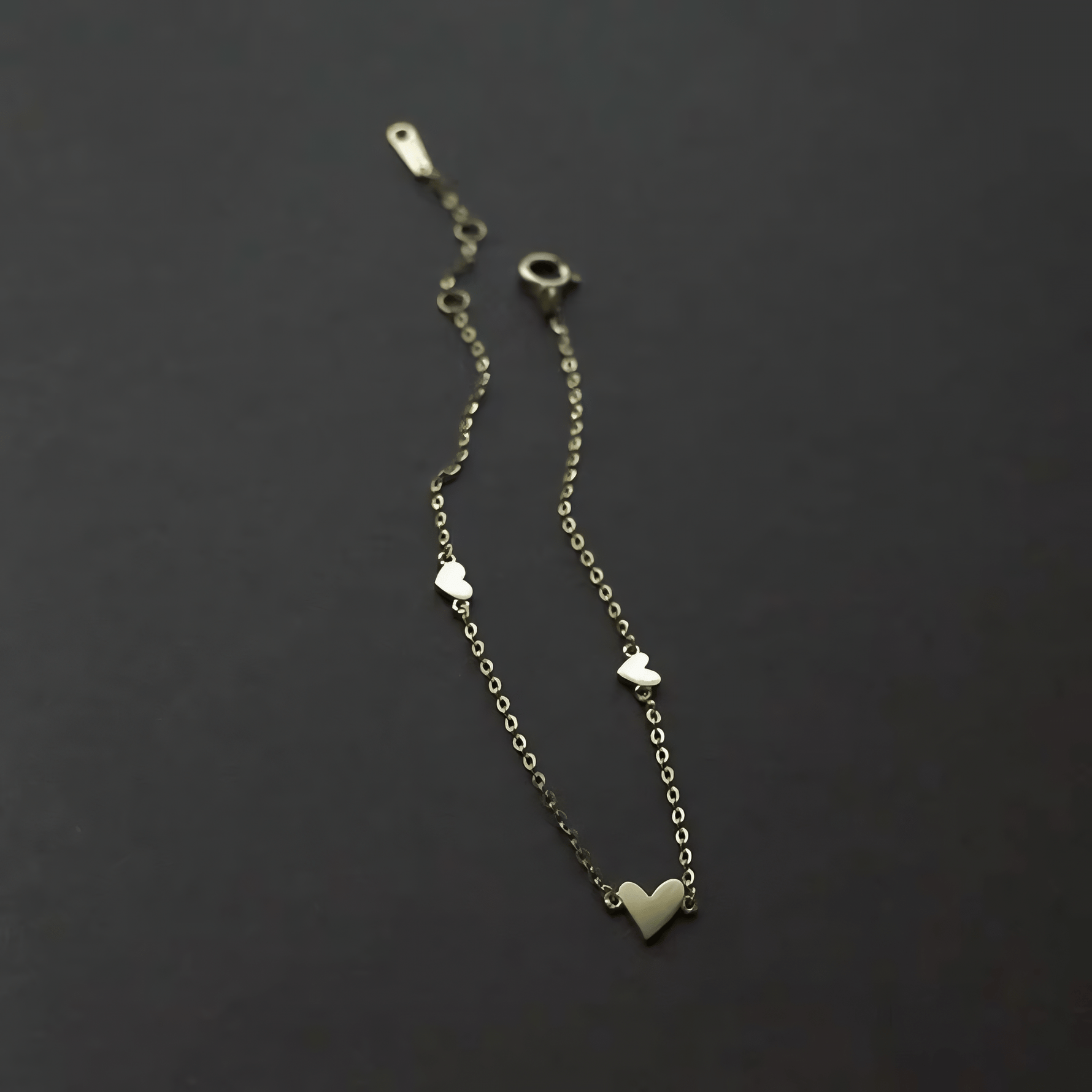 Delicate Triple Heart Bracelet – Gold on Silver - NAFALUXE