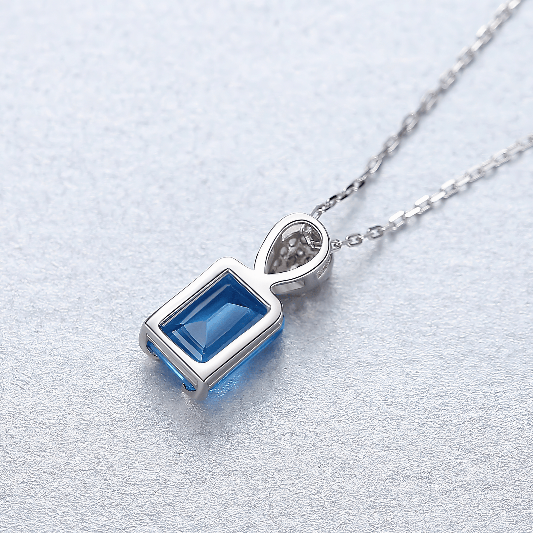 Elegant Blue Emerald - Cut CZ Sterling Silver Pendant Necklace - NAFALUXE