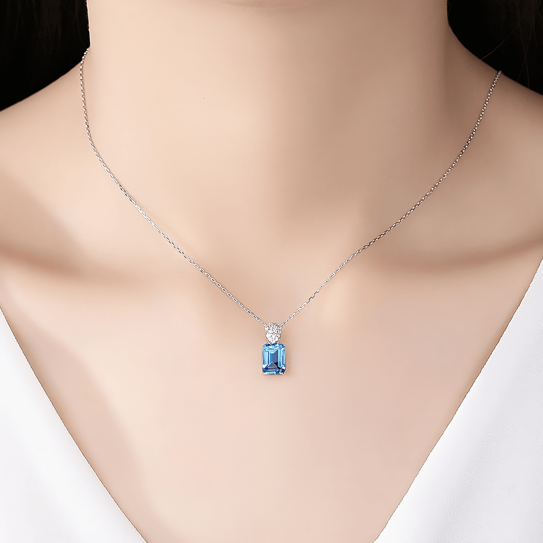Elegant Blue Emerald - Cut CZ Sterling Silver Pendant Necklace - NAFALUXE
