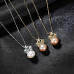 Elegant Crown Pearl Pendant Necklace with Green CZ Accents - NAFALUXE