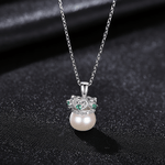 Elegant Crown Pearl Pendant Necklace with Green CZ Accents - NAFALUXE