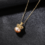 Elegant Crown Pearl Pendant Necklace with Green CZ Accents - NAFALUXE