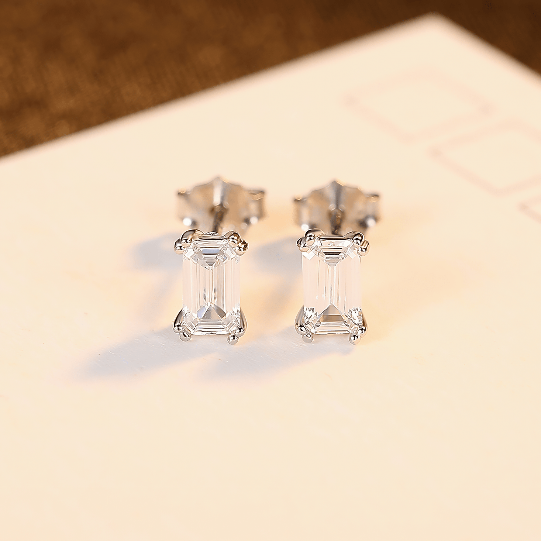 Elegant Emerald - Cut CZ Sterling Silver Stud Earrings - NAFALUXE