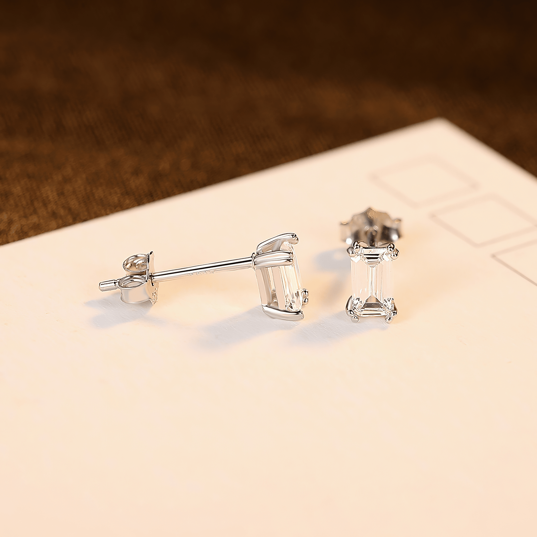 Elegant Emerald - Cut CZ Sterling Silver Stud Earrings - NAFALUXE