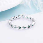 Emerald Vine – Sterling Silver Eternity Band with Marquise Green CZ Accents - NAFALUXE
