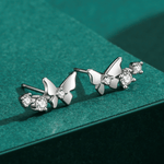 Flutter Glow – Sterling Silver Butterfly Studs - NAFALUXE