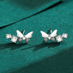 Flutter Glow – Sterling Silver Butterfly Studs - NAFALUXE