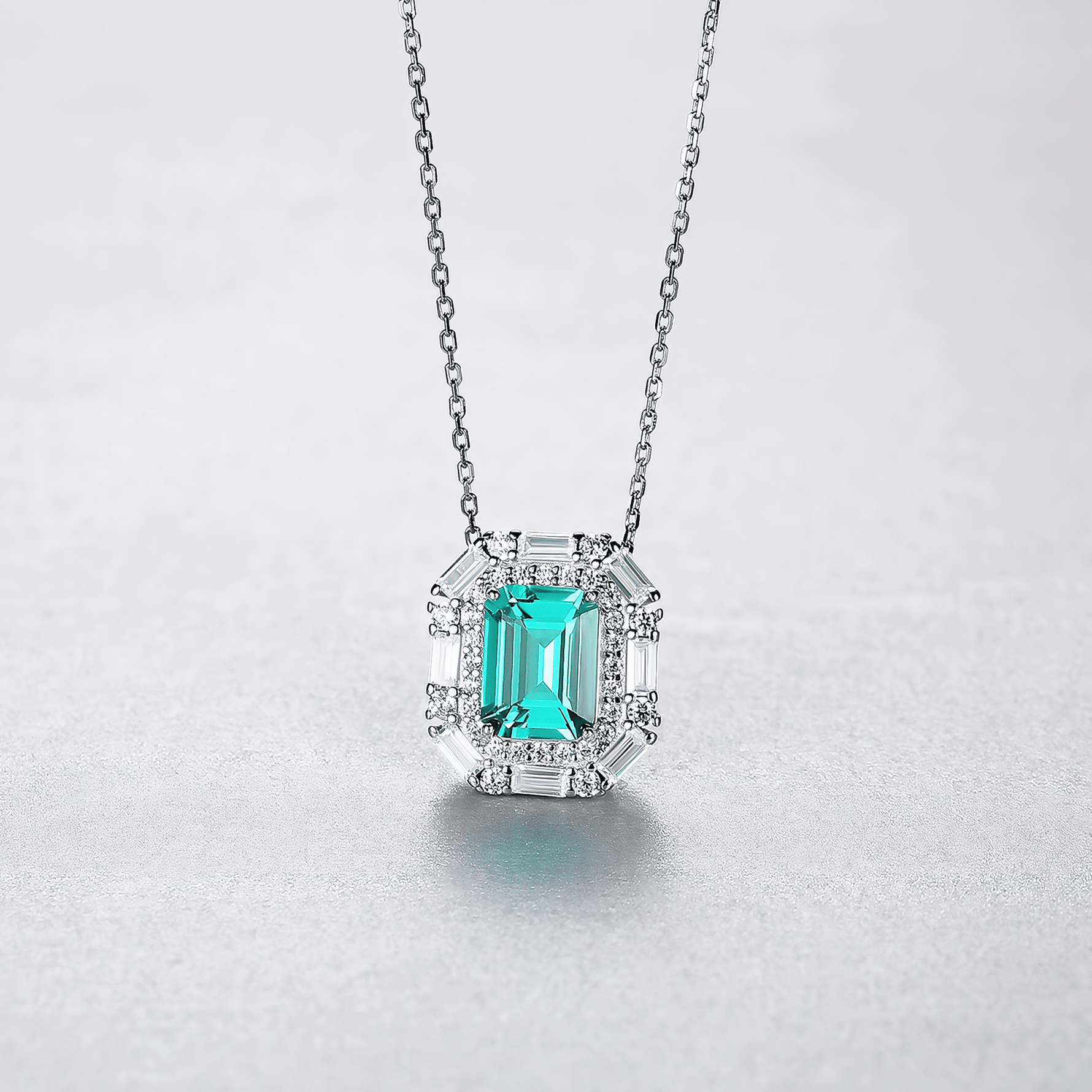 Luxury Emerald - Cut Green CZ Halo Pendant Necklace in Sterling Silver - NAFALUXE