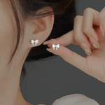 Sterling Silver 925 Bow Stud Earrings with Heart - Cut Zirconia – Elegant and Playfu - NAFALUXE