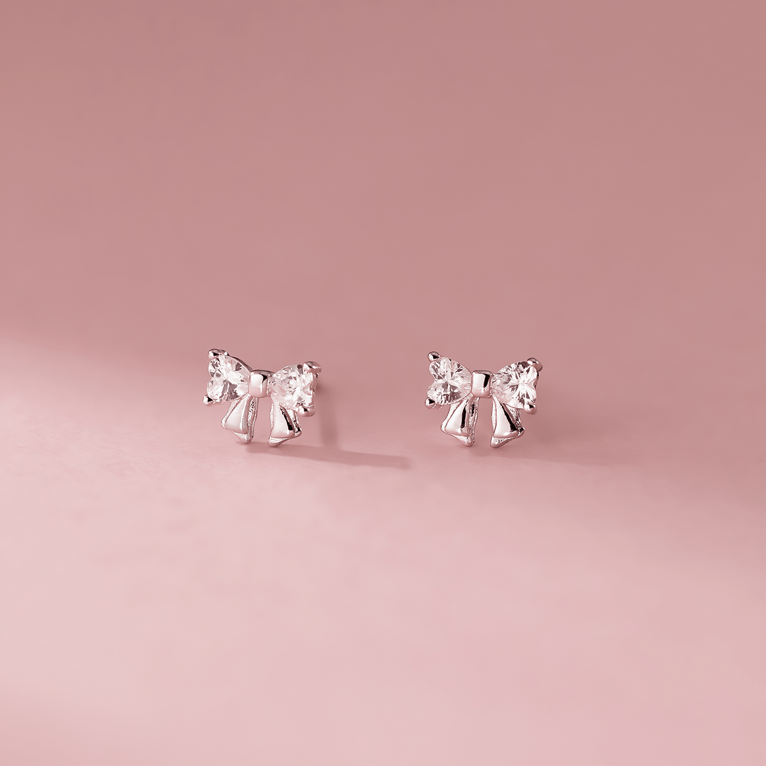 Sterling Silver 925 Bow Stud Earrings with Heart - Cut Zirconia – Elegant and Playfu - NAFALUXE