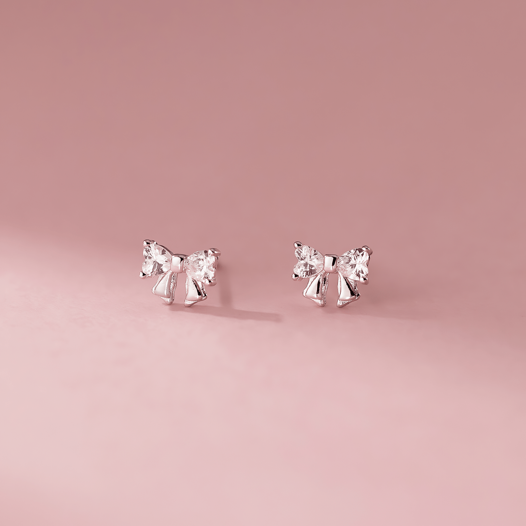 Sterling Silver 925 Bow Stud Earrings with Heart - Cut Zirconia – Elegant and Playfu - NAFALUXE