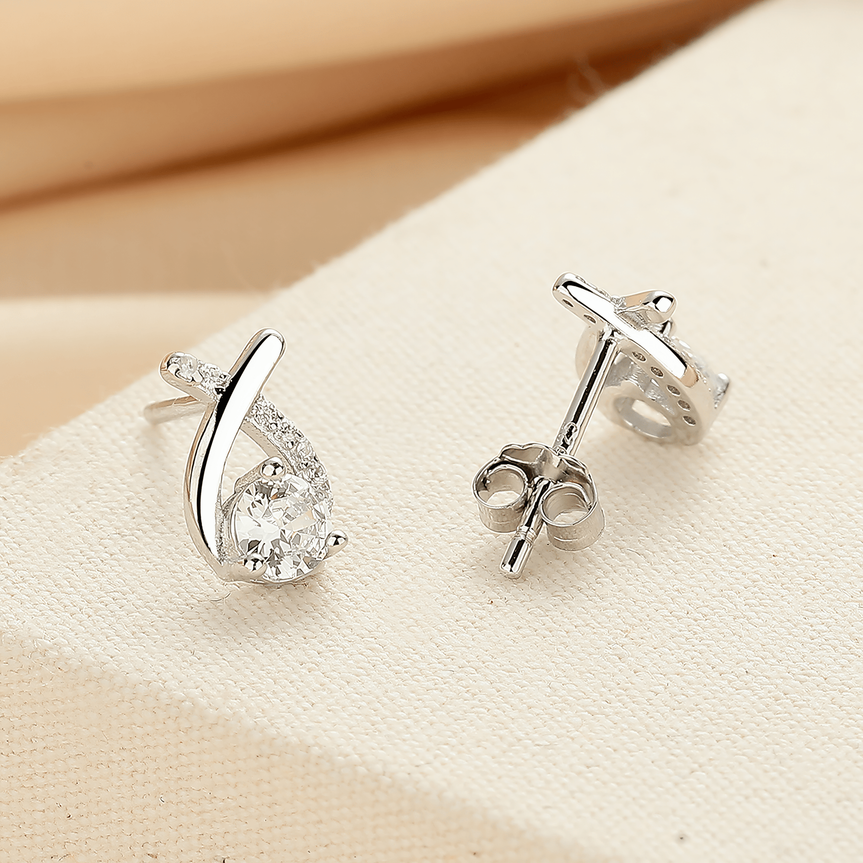 Twist Sparkle Stud Earrings – 925 Sterling Silver with Round Cut Cubic Zirconia - NAFALUXE